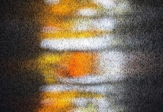 Light from leaded glass window on carpet.