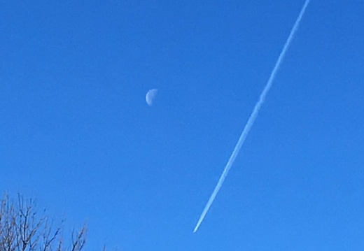Contrails and the moon this morning. #vermont #contrails #moon
