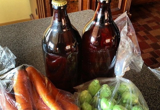 Our generous, wonderful neighbour brought us carrots, sprouts, and 2 bottles of 27-year-old hard cyder!