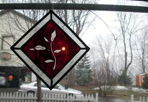 Stained Glass & BB Gun Hole