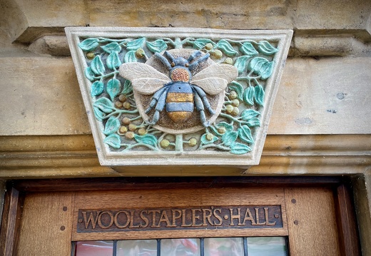 Painted Carving Above Door to Woolstapler's hall in Chipping Campden, England